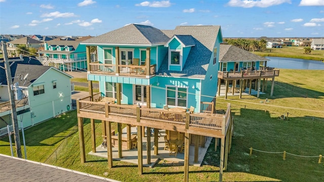 2336 Martinique, Crystal Beach, TX 77650 - rear view of property with a patio, a yard, a balcony, and a deck with water view