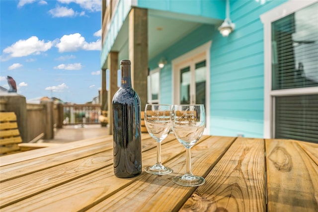 2336 Martinique, Crystal Beach, TX 77650 - wooden terrace featuring outdoor dining space