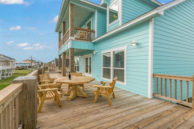 2336 Martinique, Crystal Beach, TX 77650 - deck featuring french doors, outdoor dining space, and a residential view