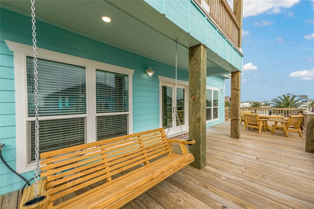 2336 Martinique, Crystal Beach, TX 77650 - wooden terrace with outdoor dining space