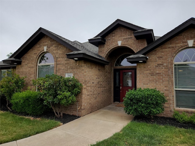 3905 Sierra Pl, Amarillo, TX 79118 - property entrance with brick siding and roof with shingles