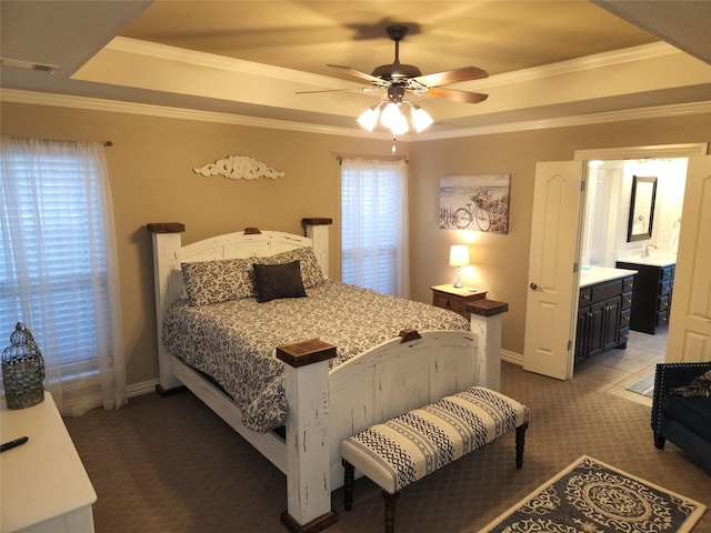 3905 Sierra Pl, Amarillo, TX 79118 - bedroom featuring a raised ceiling, carpet floors, crown molding, baseboards, and a ceiling fan