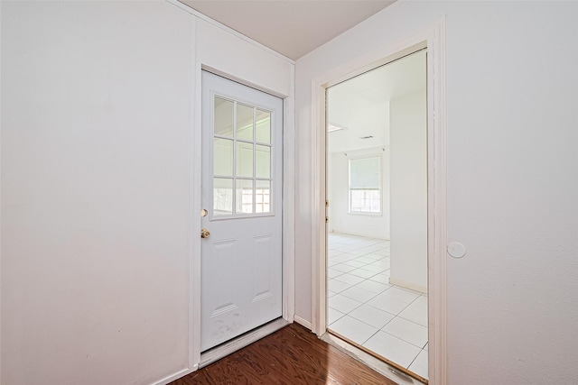 10111 Woodico Ct, Houston, TX 77038 - entryway with dark wood-style flooring