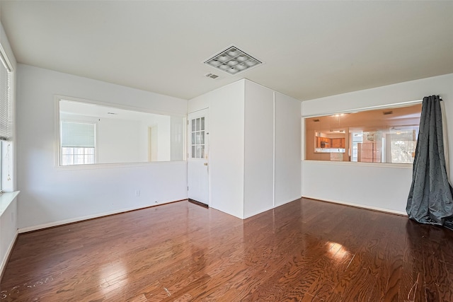 10111 Woodico Ct, Houston, TX 77038 - unfurnished living room featuring wood finished floors