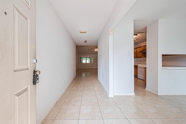 10111 Woodico Ct, Houston, TX 77038 - corridor featuring light tile patterned floors