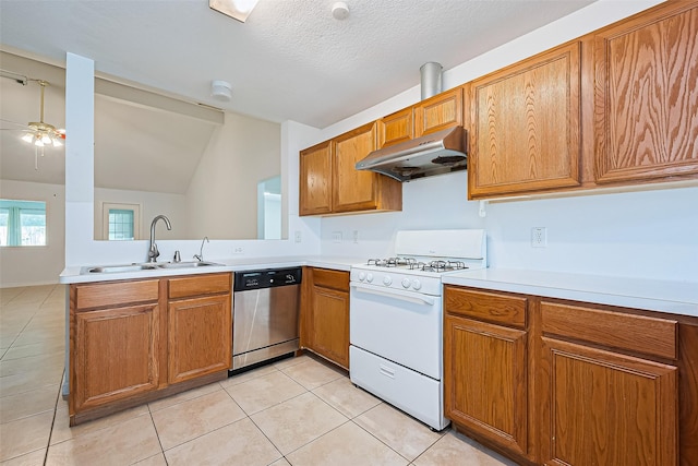 10111 Woodico Ct, Houston, TX 77038 - kitchen featuring under cabinet range hood, gas range gas stove, dishwasher, a sink, and light tile patterned floors