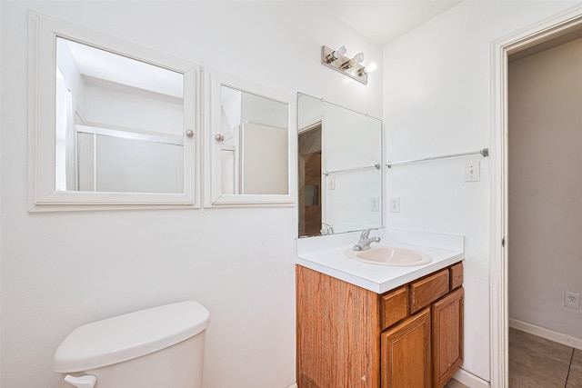 10111 Woodico Ct, Houston, TX 77038 - bathroom with toilet, vanity, and tile patterned flooring