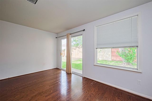 10111 Woodico Ct, Houston, TX 77038 - empty room featuring wood finished floors and baseboards