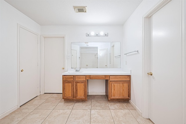 10111 Woodico Ct, Houston, TX 77038 - bathroom featuring vanity and tile patterned floors