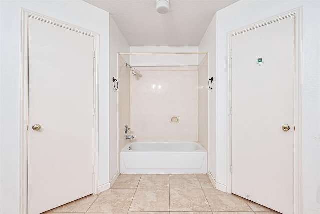 10111 Woodico Ct, Houston, TX 77038 - bathroom with tile patterned flooring, shower / washtub combination, and baseboards
