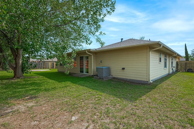 10111 Woodico Ct, Houston, TX 77038 - back of house with central AC