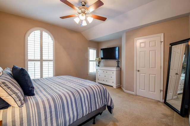 8423 Glenn Leigh Dr NE, Spring, TX 77379 - bedroom featuring light carpet, a ceiling fan, baseboards, and lofted ceiling