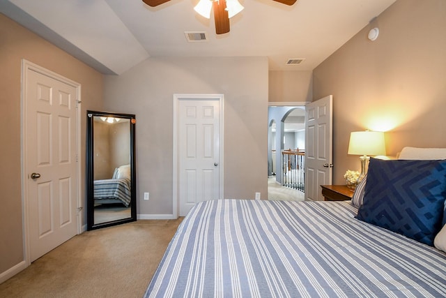 8423 Glenn Leigh Dr NE, Spring, TX 77379 - bedroom with light colored carpet, lofted ceiling, ceiling fan, and baseboards