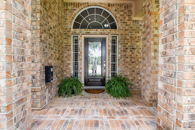 8423 Glenn Leigh Dr NE, Spring, TX 77379 - view of exterior entry featuring brick siding