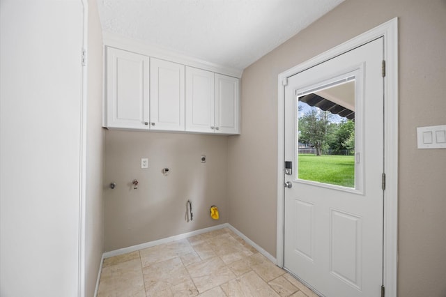 15414 Ashburton Dr, Jersey Village, TX 77040 - laundry area with hookup for a gas dryer, cabinet space, electric dryer hookup, and hookup for a washing machine