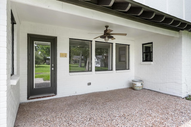 15414 Ashburton Dr, Jersey Village, TX 77040 - doorway to property featuring ceiling fan and brick siding