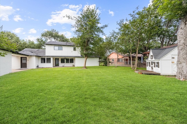 15414 Ashburton Dr, Jersey Village, TX 77040 - view of yard featuring a storage shed