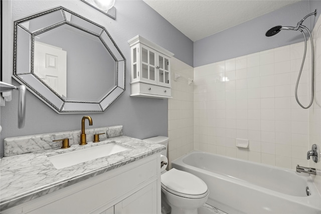 4130 Tree Moss Pl, Humble, TX 77346 - bathroom featuring toilet, vanity, shower / bathtub combination, and a textured ceiling