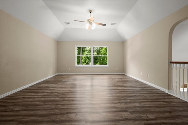 9607 Woodcliff Lake Dr, Spring, TX 77379 - bonus room featuring ceiling fan, dark wood finished floors, baseboards, arched walkways, and lofted ceiling