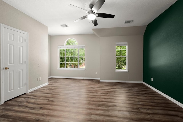 9607 Woodcliff Lake Dr, Spring, TX 77379 - empty room featuring a ceiling fan, wood finished floors, baseboards, and a textured wall