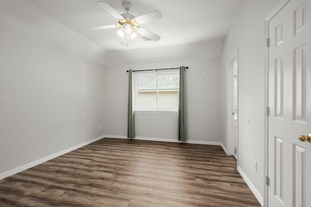 9607 Woodcliff Lake Dr, Spring, TX 77379 - unfurnished bedroom with wood finished floors, baseboards, and ceiling fan