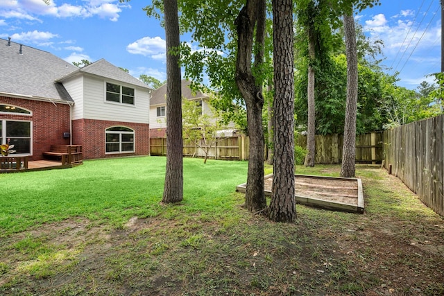 9607 Woodcliff Lake Dr, Spring, TX 77379 - view of yard featuring a wooden deck