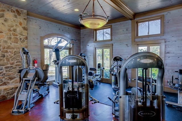 9607 Woodcliff Lake Dr, Spring, TX 77379 - gym with wooden walls, ornamental molding, and wooden ceiling
