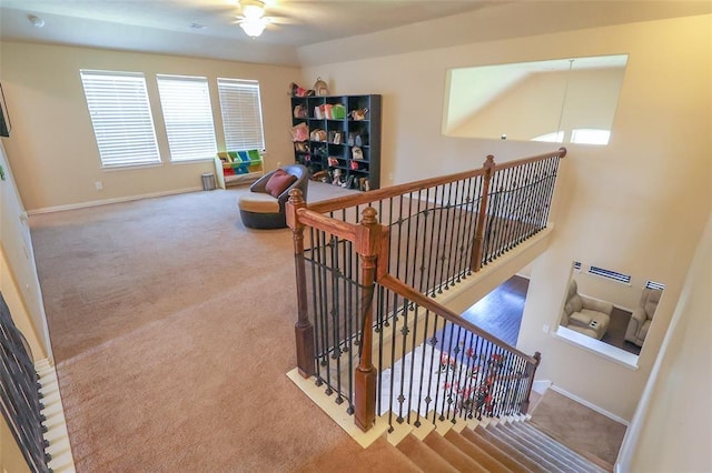 9911 Clear Diamond Dr, Rosharon, TX 77583 - stairway featuring baseboards, carpet floors, and a ceiling fan
