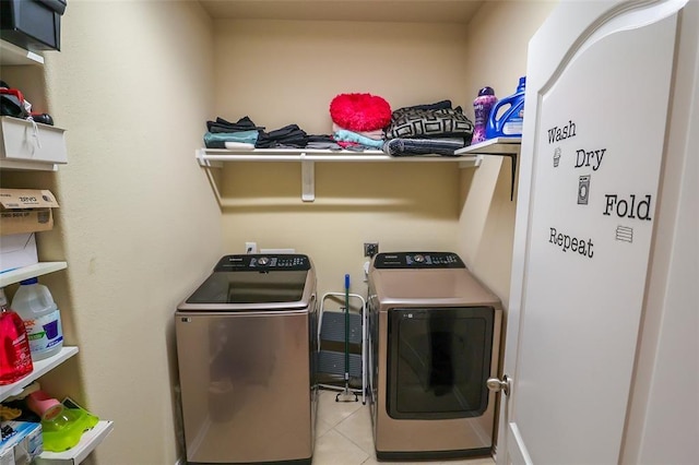 9911 Clear Diamond Dr, Rosharon, TX 77583 - laundry room with washer and dryer and light tile patterned floors