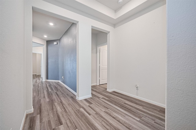 20231 Creekdale Bend Dr, Cypress, TX 77433 - spare room with wood finished floors, baseboards, recessed lighting, a textured wall, and a smoke detector