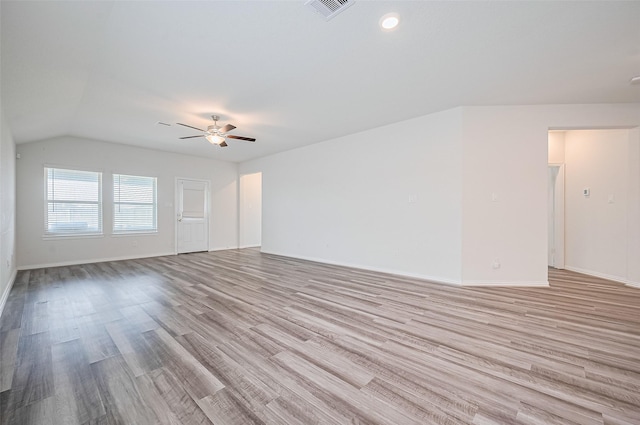 20231 Creekdale Bend Dr, Cypress, TX 77433 - empty room with light wood-type flooring, ceiling fan, baseboards, and lofted ceiling