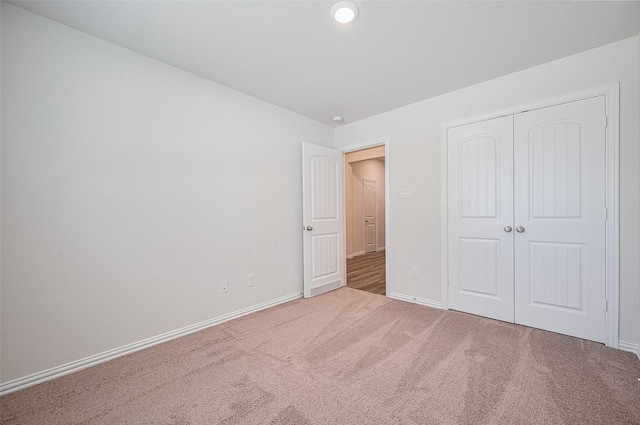 20231 Creekdale Bend Dr, Cypress, TX 77433 - unfurnished bedroom featuring carpet floors, baseboards, and a closet