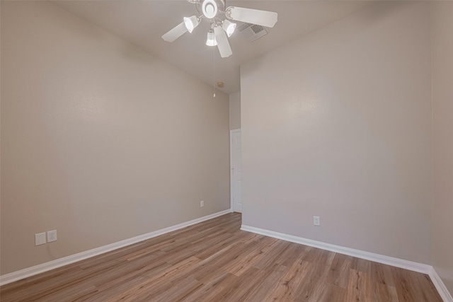 13409 Timberoak Ct, Rosharon, TX 77583 - spare room featuring light wood finished floors, a ceiling fan, and baseboards