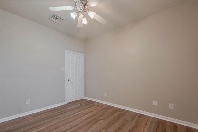 13409 Timberoak Ct, Rosharon, TX 77583 - empty room featuring light wood-type flooring, baseboards, and a ceiling fan