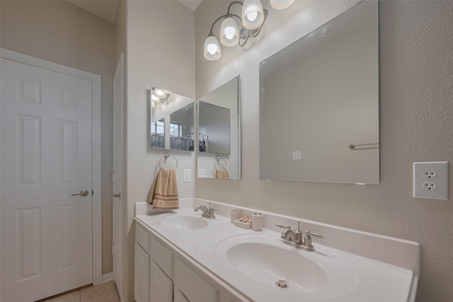 13409 Timberoak Ct, Rosharon, TX 77583 - bathroom with double vanity and tile patterned flooring