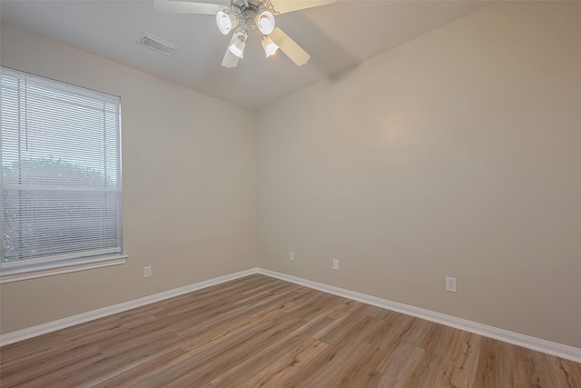 13409 Timberoak Ct, Rosharon, TX 77583 - spare room featuring light wood-type flooring, baseboards, and ceiling fan