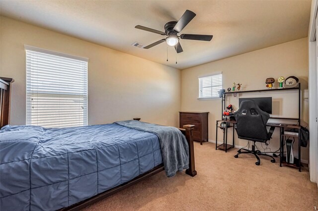 2927 Coachmaker Trl, Rosenberg, TX 77471 - bedroom with light colored carpet, a ceiling fan, and a desk