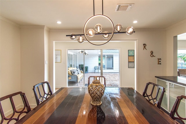 2806 Fairway Dr, Sugar Land, TX 77478 - dining space featuring ornamental molding, a chandelier, wood finished floors, baseboards, and recessed lighting