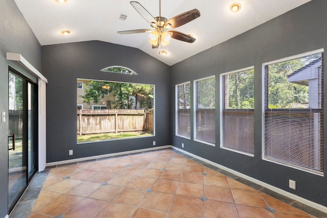 14 W Cobble Hill Cir, The Woodlands, TX 77381 - spare room featuring lofted ceiling, a ceiling fan, tile patterned floors, and baseboards