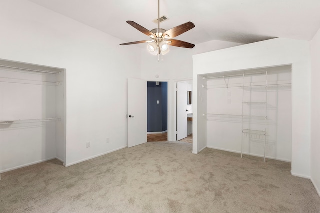 14 W Cobble Hill Cir, The Woodlands, TX 77381 - unfurnished bedroom with vaulted ceiling, carpet floors, a ceiling fan, and baseboards