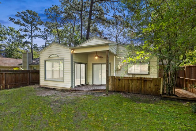 14 W Cobble Hill Cir, The Woodlands, TX 77381 - back of house with a wooden deck