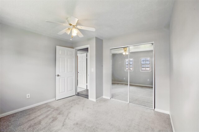 1118 Hammock St, Houston, TX 77009 - unfurnished bedroom with carpet, baseboards, a closet, and a ceiling fan