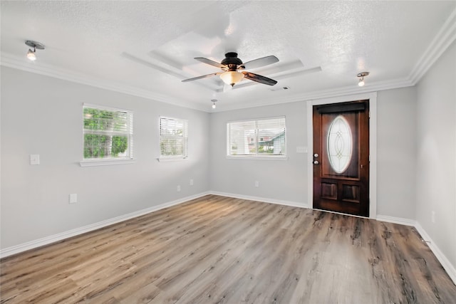 1118 Hammock St, Houston, TX 77009 - foyer with crown molding, light wood finished floors, a textured ceiling, ceiling fan, and baseboards