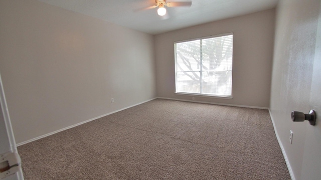 1203 Brook Grove Dr, Katy, TX 77450 - carpeted spare room with a ceiling fan and baseboards
