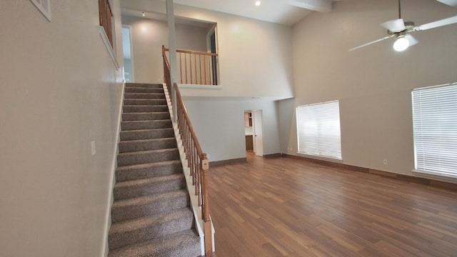 1203 Brook Grove Dr, Katy, TX 77450 - staircase featuring wood finished floors, ceiling fan, high vaulted ceiling, baseboards, and beamed ceiling