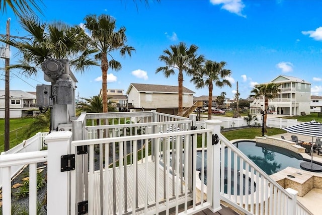 3931 Fort Bend Dr, Galveston, TX 77554 - balcony featuring a residential view