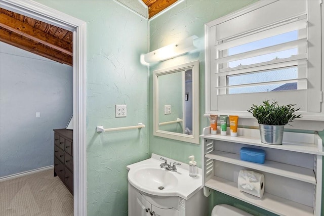 3931 Fort Bend Dr, Galveston, TX 77554 - bathroom featuring vanity and baseboards