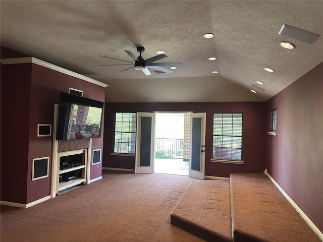 2406 Meadow Tree Ln, Spring, TX 77388 - entryway with carpet flooring, baseboards, ceiling fan, a textured ceiling, and plenty of natural light