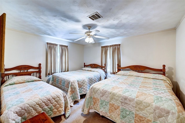 6 Hickory Holw, Huntsville, TX 77320 - bedroom with carpet, ceiling fan, and crown molding