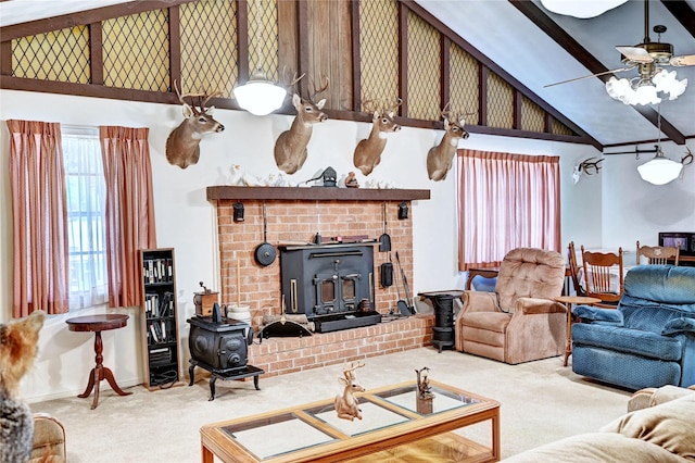 6 Hickory Holw, Huntsville, TX 77320 - carpeted living area with a wood stove, high vaulted ceiling, and a ceiling fan